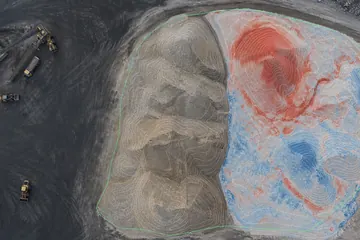 Cut-and-fill visualization over an aggregate yard